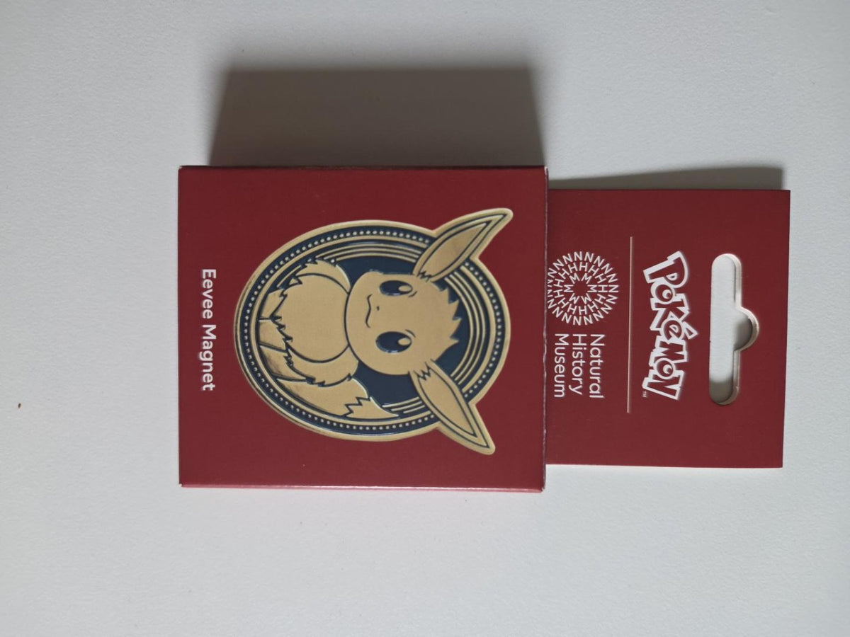 Actual Pokémon × Natural History Museum Eevee magnet in its original red packaging